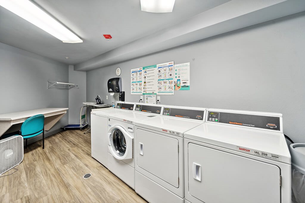 A laundry room with a washer and dryer.